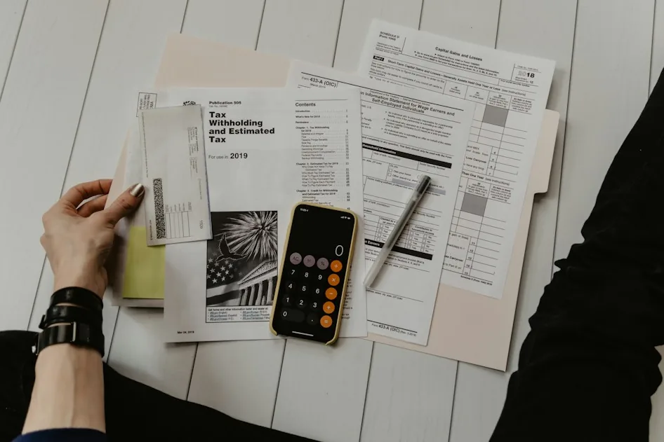 Financial records and invoices being checked