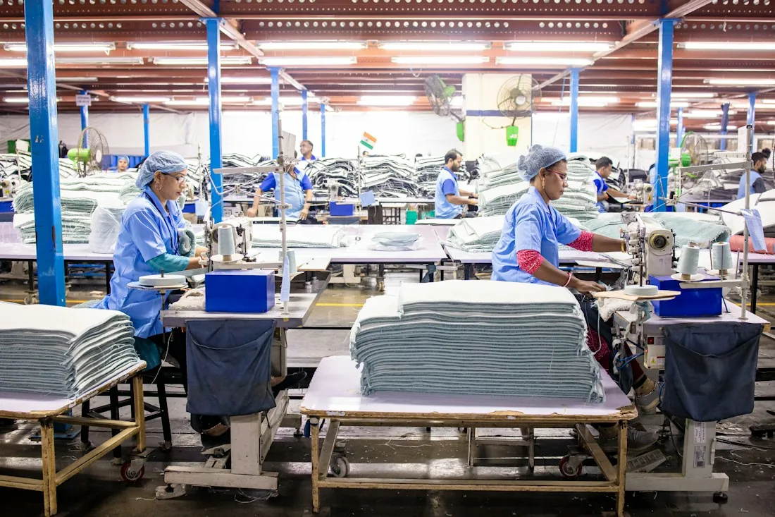 Workers on a textile production floor